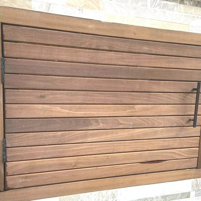 Our collection of Cambia Wood slats have been used to create this kitchen storage door.