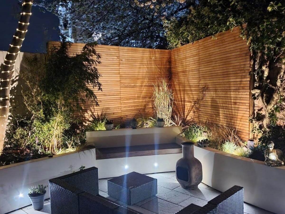 Red cedar, a fire pit and a select choice of zen-inspiring ornaments help transform this city garden into a peaceful haven.