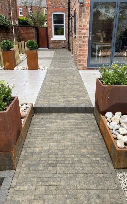 This renovation project uses our tulip wood slats and Corten Steel sections.