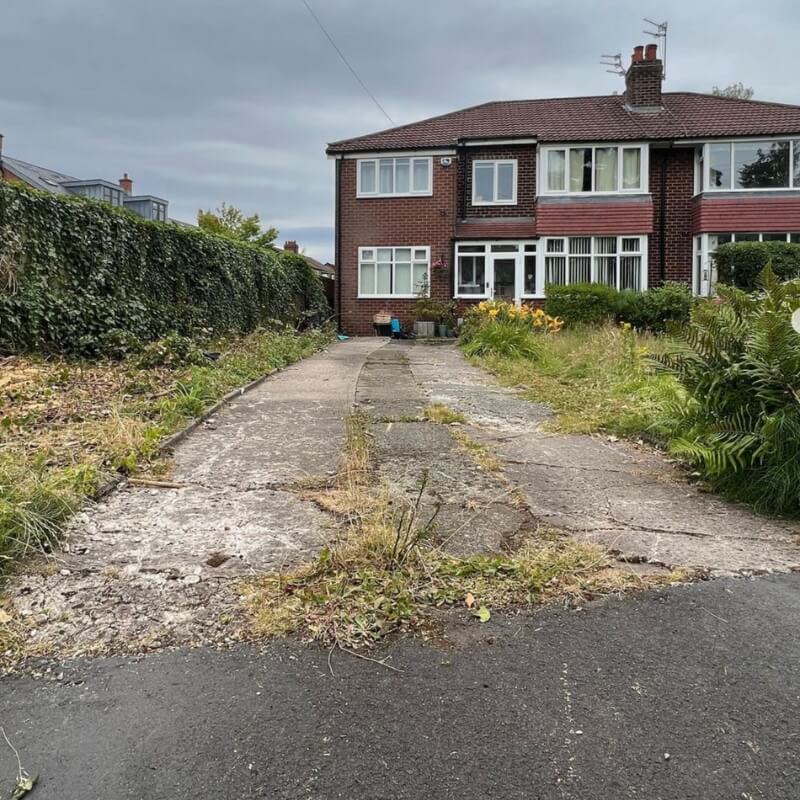 The trees and bushes had originally caused an unsightly obstruction on this driveway.