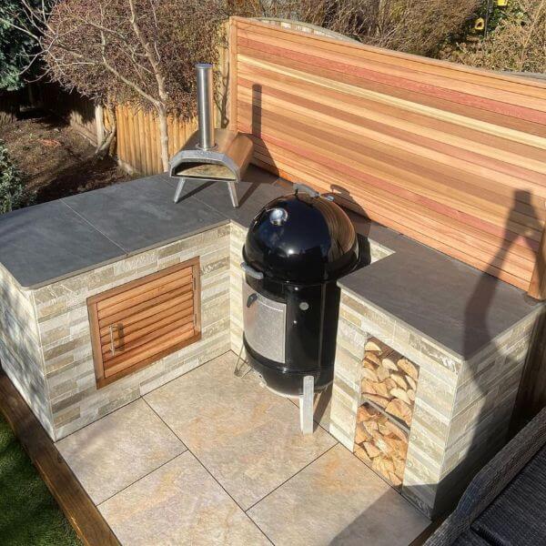 This outdoor BBQ kitchen uses our range of Cedar slats for the main backdrop.