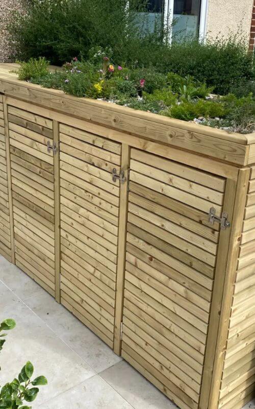 Our tanalised timbers have been used to create this pram and bin store.